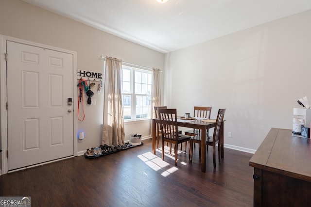 247 Morgan Field Blvd, Ludowici, GA 31316 - dining area with dark wood-style flooring and baseboards