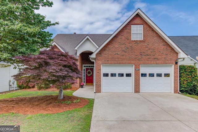 3585 Berkeley Park Ct, Duluth, GA 30096 - traditional-style house with brick siding, driveway, roof with shingles, and a front lawn