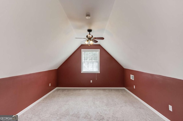 3585 Berkeley Park Ct, Duluth, GA 30096 - additional living space with a ceiling fan, vaulted ceiling, carpet flooring, and baseboards