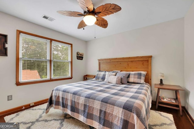 1925 Stonewyck Ct, Cumming, GA 30041 - bedroom featuring wood finished floors and a ceiling fan