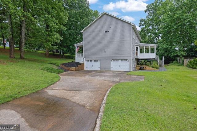 1925 Stonewyck Ct, Cumming, GA 30041 - view of side of property with stairs, an attached garage, driveway, and a yard