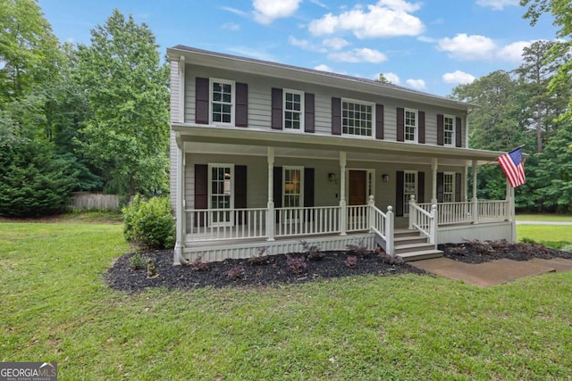 1925 Stonewyck Ct, Cumming, GA 30041 - colonial house with a porch and a front yard