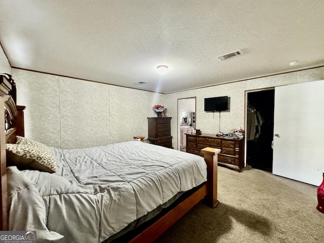 342 Wellington Dr, Byron, GA 31008 - carpeted bedroom with a textured ceiling