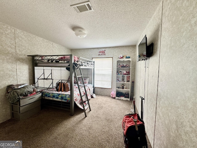 342 Wellington Dr, Byron, GA 31008 - bedroom with a textured ceiling, carpet floors, and lofted ceiling