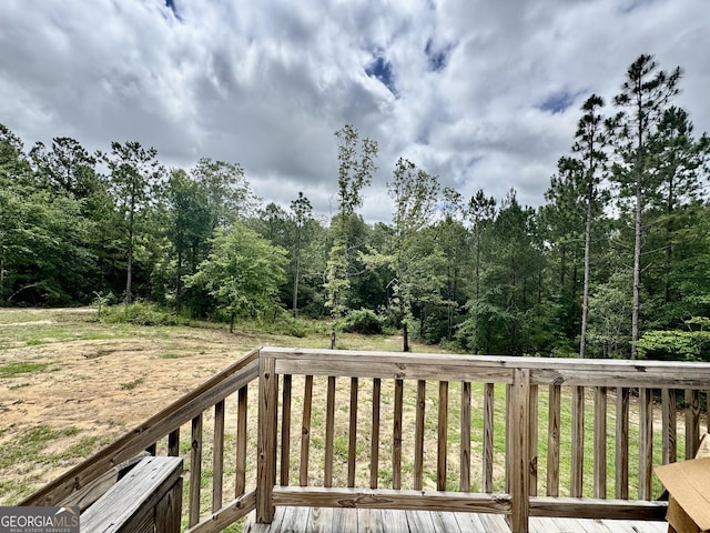 342 Wellington Dr, Byron, GA 31008 - wooden terrace featuring a forest view