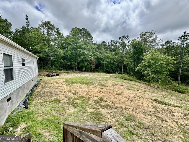 342 Wellington Dr, Byron, GA 31008 - view of yard featuring a view of trees