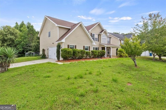3385 Amhurst Pkwy, South Fulton, GA 30349 - traditional home featuring an attached garage, concrete driveway, and a front yard