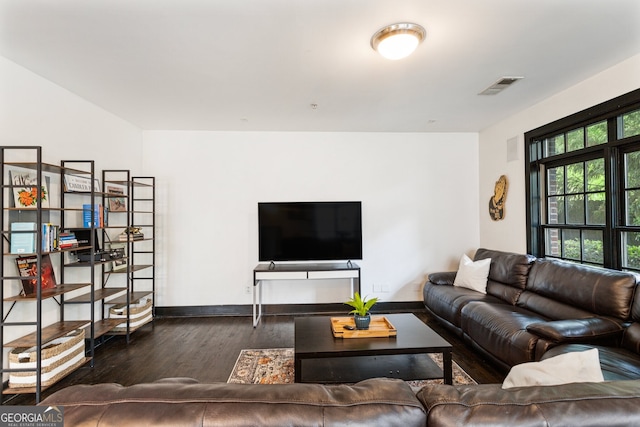 1300 Dekalb Ave NE Unit 711, Atlanta, GA 30307 - living area featuring dark wood-style flooring and baseboards