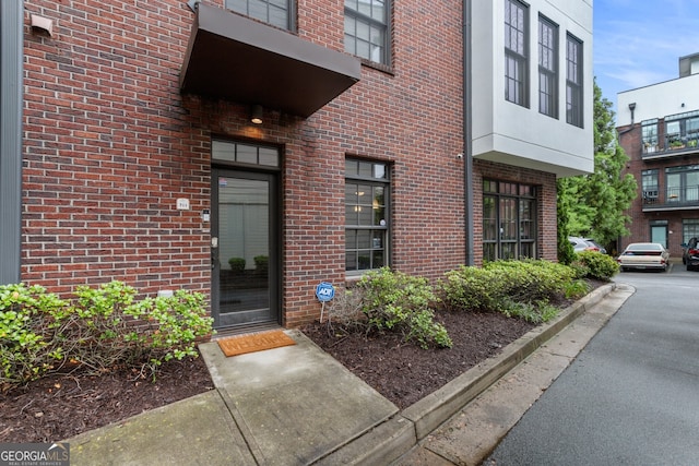 1300 Dekalb Ave NE Unit 711, Atlanta, GA 30307 - view of exterior entry with brick siding