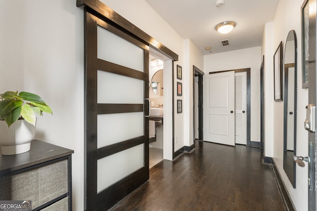 1300 Dekalb Ave NE Unit 711, Atlanta, GA 30307 - hallway featuring wood finished floors