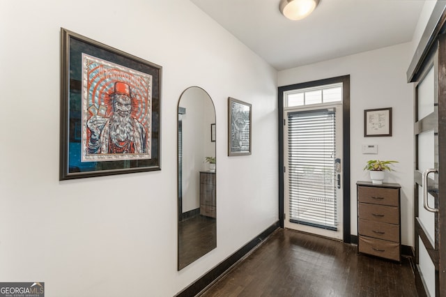 1300 Dekalb Ave NE Unit 711, Atlanta, GA 30307 - foyer entrance featuring dark wood-style floors and arched walkways