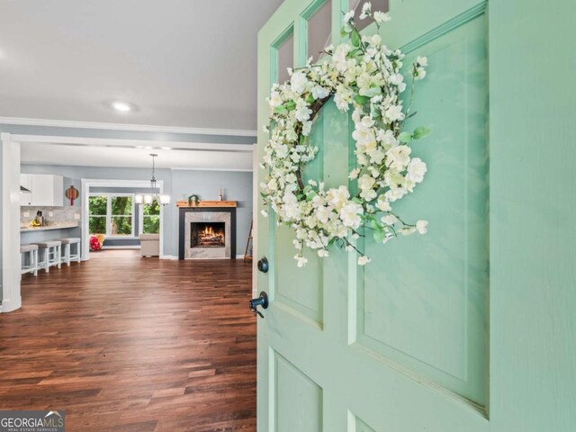 1488 Vine St NE, Gainesville, GA 30501 - entryway with dark wood finished floors, a high end fireplace, ornamental molding, and baseboards