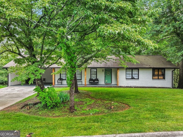 1488 Vine St NE, Gainesville, GA 30501 - view of front of home with covered porch, a front lawn, brick siding, and concrete driveway