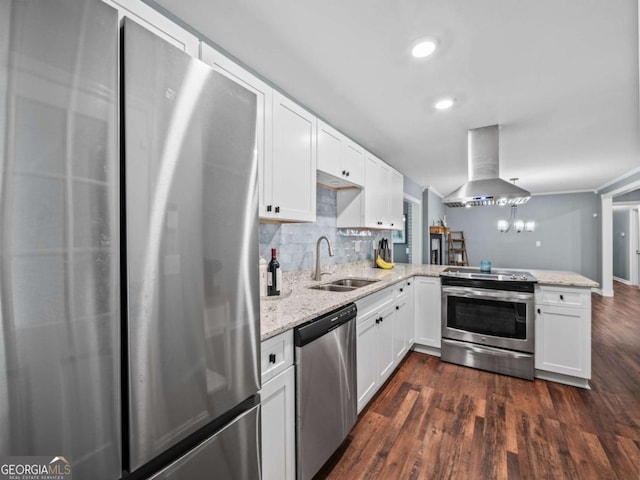 1488 Vine St NE, Gainesville, GA 30501 - kitchen with stainless steel appliances, island exhaust hood, a sink, a peninsula, and white cabinets