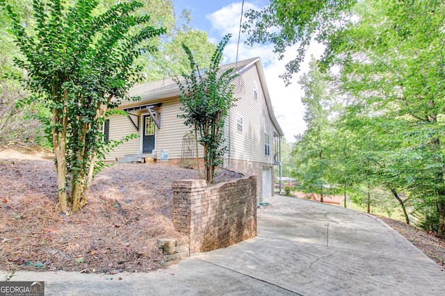 86 Waters Dr, Wedowee, AL 36278 - view of front of house featuring concrete driveway and an attached garage