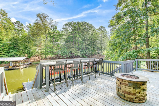 86 Waters Dr, Wedowee, AL 36278 - wooden deck with a fire pit, a water view, and a dock