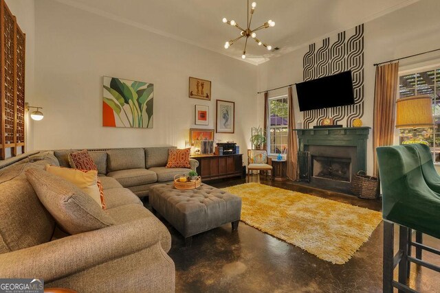 2295 Hemrick Rd, Cumming, GA 30041 - living room with a chandelier, a fireplace with flush hearth, and crown molding