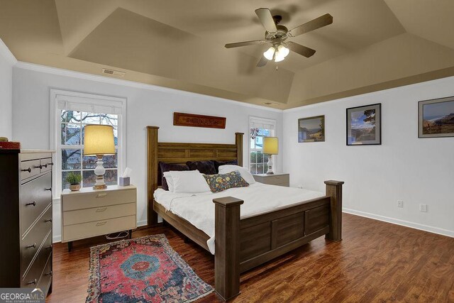 2295 Hemrick Rd, Cumming, GA 30041 - bedroom featuring multiple windows, lofted ceiling, dark wood finished floors, and ceiling fan