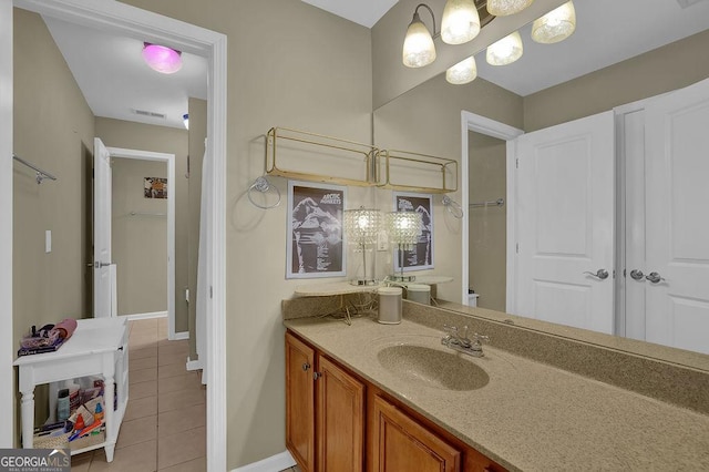 2295 Hemrick Rd, Cumming, GA 30041 - bathroom with tile patterned flooring and vanity