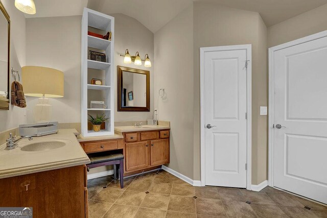 2295 Hemrick Rd, Cumming, GA 30041 - full bathroom with double vanity and tile patterned floors