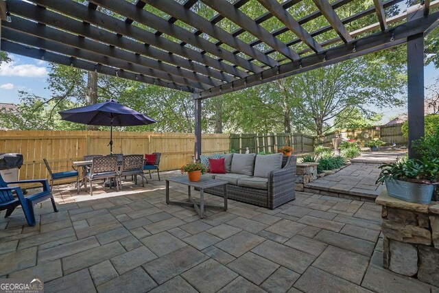 2295 Hemrick Rd, Cumming, GA 30041 - fenced backyard with an outdoor living space, outdoor dining area, a patio area, and a pergola