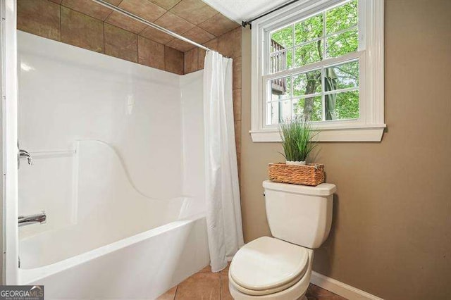 1206 Mountainside Trce NW, Kennesaw, GA 30152 - bathroom featuring toilet, shower / tub combo, and baseboards