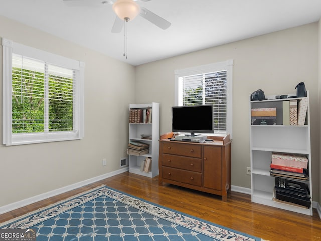 571 Swint Rd, Griffin, GA 30224 - bedroom featuring wood finished floors, baseboards, and a ceiling fan