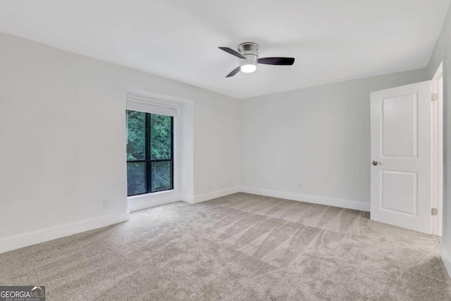 206 Tuxworth Cir, Decatur, GA 30033 - spare room featuring ceiling fan, carpet flooring, and baseboards