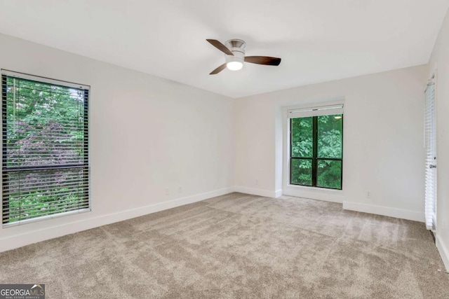 206 Tuxworth Cir, Decatur, GA 30033 - spare room featuring ceiling fan, carpet floors, and baseboards