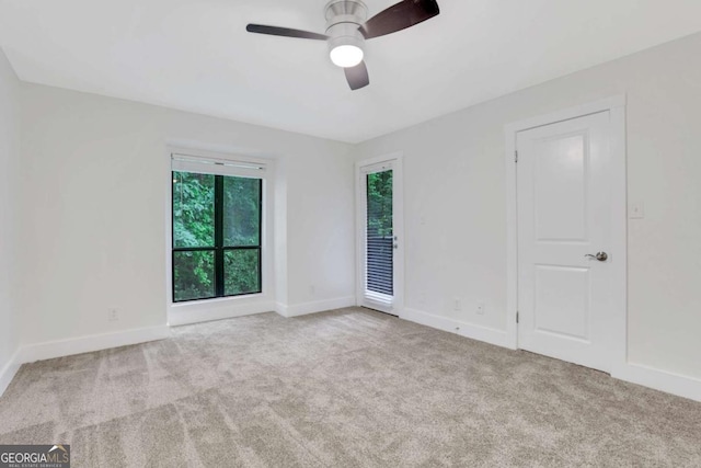 206 Tuxworth Cir, Decatur, GA 30033 - empty room featuring carpet, ceiling fan, and baseboards