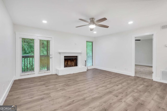 206 Tuxworth Cir, Decatur, GA 30033 - unfurnished living room featuring ceiling fan, wood finished floors, baseboards, a fireplace, and recessed lighting