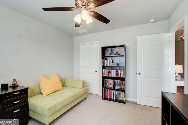 1300 Jefferson Walk Cir, Jefferson, GA 30549 - living area featuring light colored carpet and ceiling fan