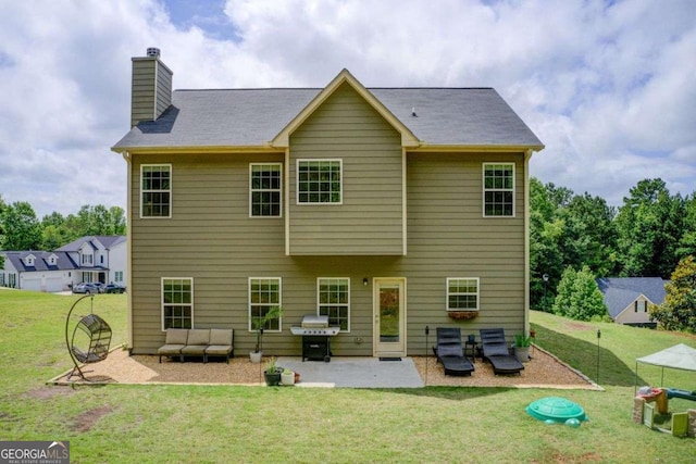 1300 Jefferson Walk Cir, Jefferson, GA 30549 - back of house featuring a patio, a chimney, a lawn, and an outdoor living space