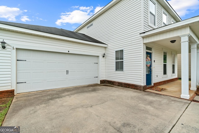 106 Thornton Dr, Bonaire, GA 31005 - view of property exterior with concrete driveway and a garage