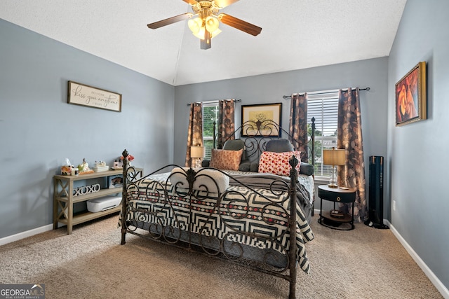 106 Thornton Dr, Bonaire, GA 31005 - carpeted bedroom with lofted ceiling, baseboards, and a ceiling fan