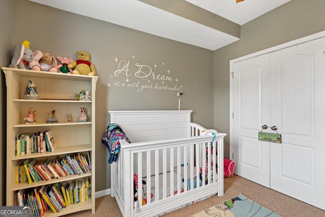 106 Thornton Dr, Bonaire, GA 31005 - carpeted bedroom with a nursery area and a closet