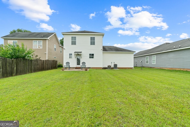 106 Thornton Dr, Bonaire, GA 31005 - rear view of house featuring a patio area and central AC unit