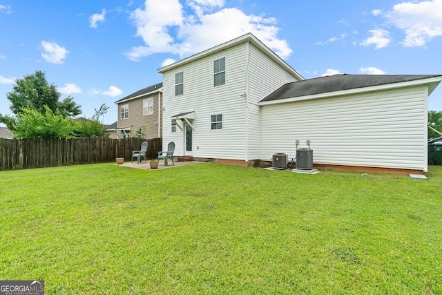 106 Thornton Dr, Bonaire, GA 31005 - back of house with a patio area and central AC