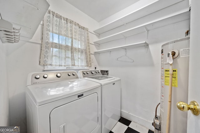 3047 Hudson Ct, Decatur, GA 30033 - laundry room with gas water heater, washer and dryer, and tile patterned floors
