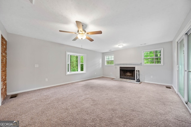 3047 Hudson Ct, Decatur, GA 30033 - unfurnished living room with a fireplace with flush hearth, carpet flooring, and a ceiling fan