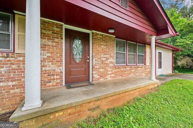 3047 Hudson Ct, Decatur, GA 30033 - view of exterior entry featuring a porch and brick siding