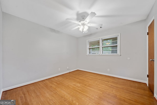 3047 Hudson Ct, Decatur, GA 30033 - unfurnished room featuring light wood-style floors and a ceiling fan