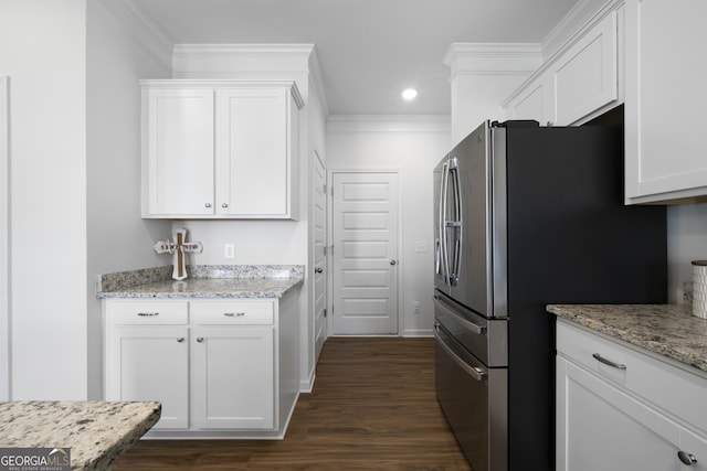 22 Mossy Oaks Ln NE, Rome, GA 30165 - kitchen featuring stainless steel refrigerator with ice dispenser, white cabinetry, dark wood finished floors, ornamental molding, and light stone counters