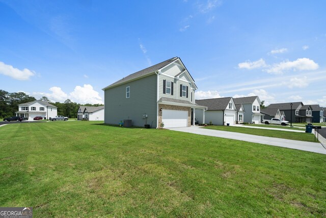 22 Mossy Oaks Ln NE, Rome, GA 30165 - view of home's exterior with a garage, driveway, a yard, and a residential view