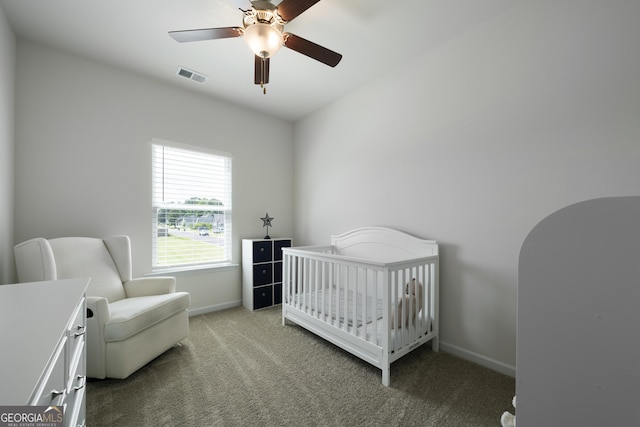 22 Mossy Oaks Ln NE, Rome, GA 30165 - carpeted bedroom featuring a crib and a ceiling fan