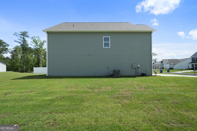 22 Mossy Oaks Ln NE, Rome, GA 30165 - view of home's exterior with a lawn and a central air condition unit