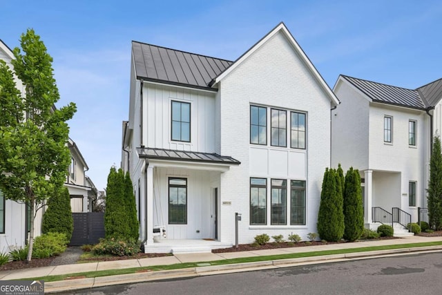 6815 Halcyon Way, Alpharetta, GA 30005 - modern inspired farmhouse with a standing seam roof and metal roof