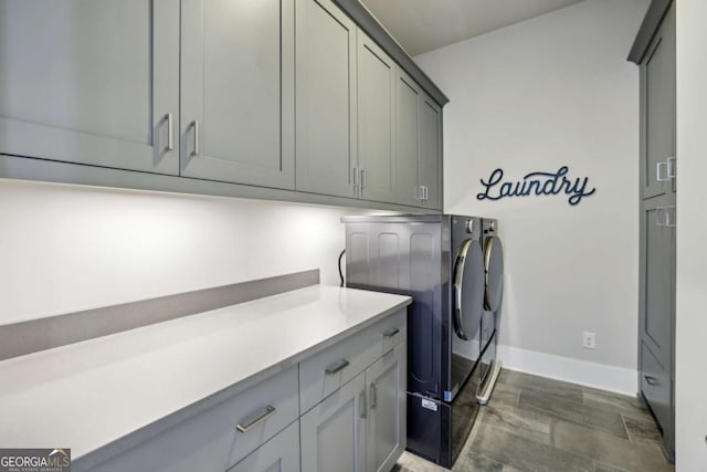 6815 Halcyon Way, Alpharetta, GA 30005 - laundry room featuring cabinet space, independent washer and dryer, and baseboards