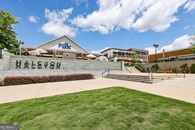 6815 Halcyon Way, Alpharetta, GA 30005 - view of home's community featuring a lawn