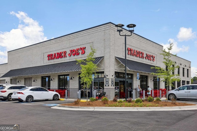 6815 Halcyon Way, Alpharetta, GA 30005 - view of commercial property with uncovered parking